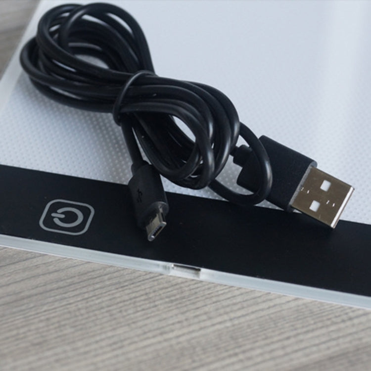 超薄 A4 尺寸便攜式 USB LED 藝術描圖燈箱複寫板，具亮度調節功能，適合藝術家繪畫素描動畫及 X 光檢視，亮度調節