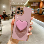 電鍍愛心指環支架 TPU 手機殼，適用於 iPhone 17e / 16e、iPhone 17 Pro Max、iPhone 17 Pro、iPhone 17、iPhone Air、iPhone 16 Pro Max、iPhone 16 Pro、iPhone 16 Plus
