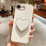 電鍍愛心指環支架 TPU 手機殼，適用於 iPhone 17e / 16e、iPhone 17 Pro Max、iPhone 17 Pro、iPhone 17、iPhone Air、iPhone 16 Pro Max、iPhone 16 Pro、iPhone 16 Plus