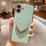 電鍍愛心指環支架 TPU 手機殼，適用於 iPhone 17e / 16e、iPhone 17 Pro Max、iPhone 17 Pro、iPhone 17、iPhone Air、iPhone 16 Pro Max、iPhone 16 Pro、iPhone 16 Plus