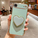 電鍍愛心指環支架 TPU 手機殼，適用於 iPhone 17e / 16e、iPhone 17 Pro Max、iPhone 17 Pro、iPhone 17、iPhone Air、iPhone 16 Pro Max、iPhone 16 Pro、iPhone 16 Plus